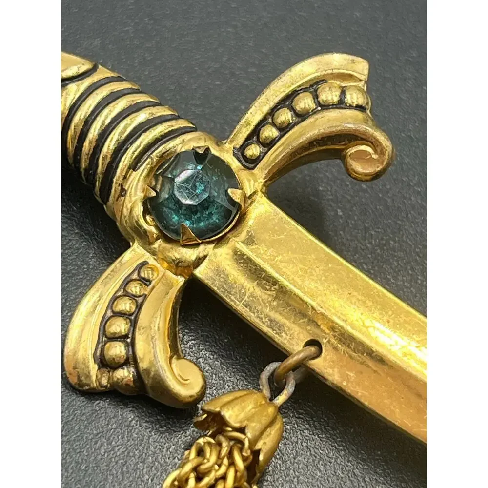 Coro Vintage Signed Gold‎ Tone Sword Dagger Brooch With Tassels and Green Stone